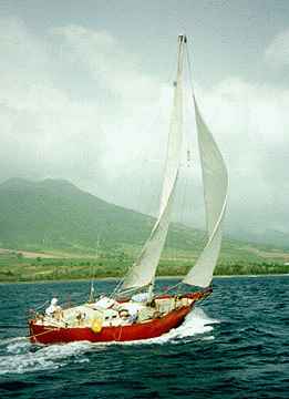 Rich's wife Wieke sailing their boat Golem off of St. Kitt